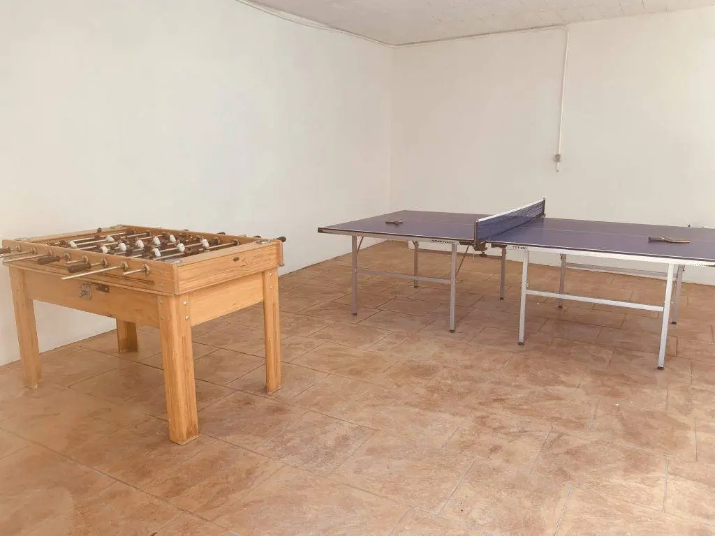 Sala de juegos: futbolín y ping-pong